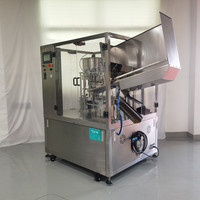 Machine automatique de remplissage et de scellage de tubes pour shampoing, dentifrice, gel