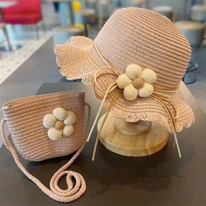 Venta al por mayor nueva moda sol playa sombrero bolsa 2 uds conjunto flor encantadora niños sombrero de paja transpirable bebé niña gorras - Product Image 2