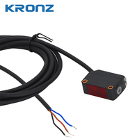 Sensor Fotoelektrik Kompak KRONZ dengan Supresi Latar Belakang (BGS), Jarak Deteksi 40-200mm, Indikator LED, Kompatibel dengan Balluff, IP67