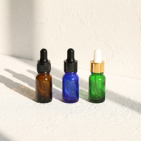 Bouteille d'huile essentielle de 10ml flacon compte-gouttes gradué sérum Essence emballage vert Mini bouteille en verre cosmétique sérigraphie bleu