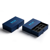 Boîte cadeau rigide bleu foncé avec logo personnalisé, boîte coulissante de luxe personnalisable avec insert en EVA floqué noir