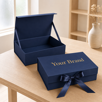 Boîte cadeau de luxe pour cosmétiques avec logo personnalisé, ruban et nœud, design rigide bleu pour petites entreprises et coffrets promotionnels
