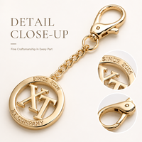 Pendentif de sac de luxe en alliage de zinc doré poli avec motif loup hurlant et logo de marque gravé, porte-clés métallique personnalisé