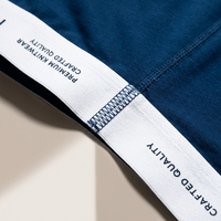 Machine automatique de pose de ceintures élastiques pour sous-vêtements, culottes, slips, boxers