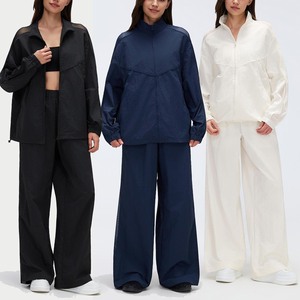 Ensemble de yoga YIYI 2 pièces à col montant et fermeture éclair intégrale <span class=keywords><strong>pour</strong></span> <span class=keywords><strong>femme</strong></span>, survêtement oversize à séchage rapide, pantalon large à taille élastique, tenue de sport <span class=keywords><strong>pour</strong></span> <span class=keywords><strong>femme</strong></span> - Product Image 1