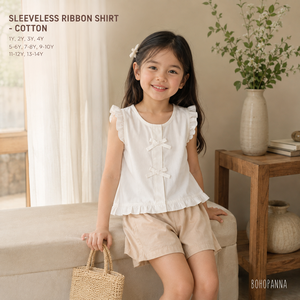 La comodidad diaria comienza con la camiseta sin mangas con lazo, de algodón suave y transpirable, con un ajuste flexible para los más pequeños activos. - Product Image 3