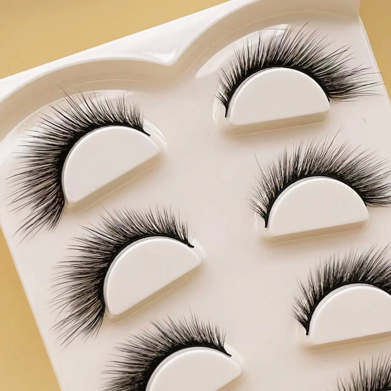 Özel etiket wispy yarım şerit lashes toptan doğal kedi göz lashes 3d sahte vizon kirpik satıcı