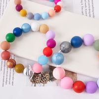 Productos de Venta caliente 2023 logotipo personalizado colores mezclados forma redonda cuentas sueltas de silicona DIY pulsera cuentas para la fabricación de joyas