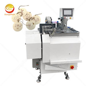 Machine automatique ORME pour l'insertion de fils dans les étiquettes de vêtements - Product Image 1