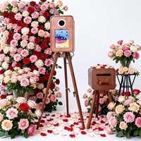 Machine de photomaton numérique compatible avec les appareils photo reflex numériques et les iPad, idéale pour les mariages et les événements.