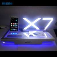 Présentoir de comptoir de bureau au détail de haute qualité Base acrylique lumineuse pour supports d'affichage de vente de téléphone portable
