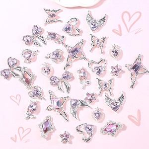 Vente en gros de plusieurs styles de breloques de décoration d'<span class=keywords><strong>ongles</strong></span> en strass <span class=keywords><strong>pour</strong></span> les décorations de <span class=keywords><strong>faux</strong></span> <span class=keywords><strong>ongles</strong></span> en cristal avec nœud papillon 3d et cœur - Product Image 6