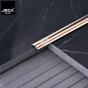 Foshan Factory JECA Hot new curved T-shape Tile Trim piastrelle in acciaio inossidabile profil striscia d'oro per la decorazione del pavimento della parete