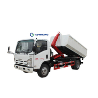 Camion benne à ordures diesel ISUZU 4x2 avec crochet, chargement latéral 5m³/10m³, transmission manuelle avec moteur et boîte de vitesses, en promotion