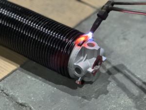 Resorte de torsión galvanizado y duradero, resorte de torsión de funcionamiento estable y profesional para puertas de muelles de carga con certificación CE - Product Image 2