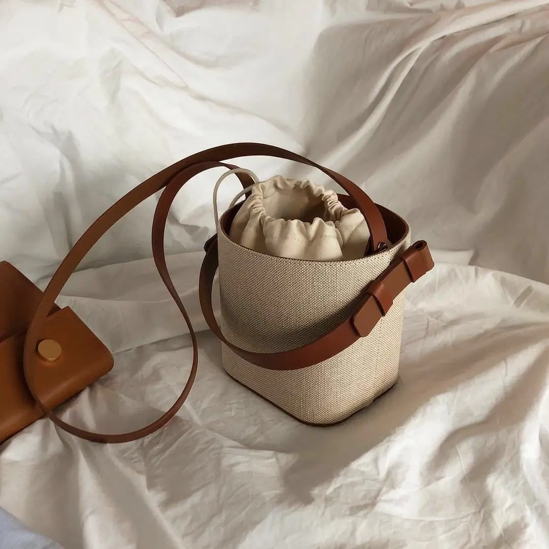New INS Popular Designer Small Tote Bag Unisex Canvas PU Leather Bucket Bag Single Shoulder Crossbody Clutch Handbag for Women