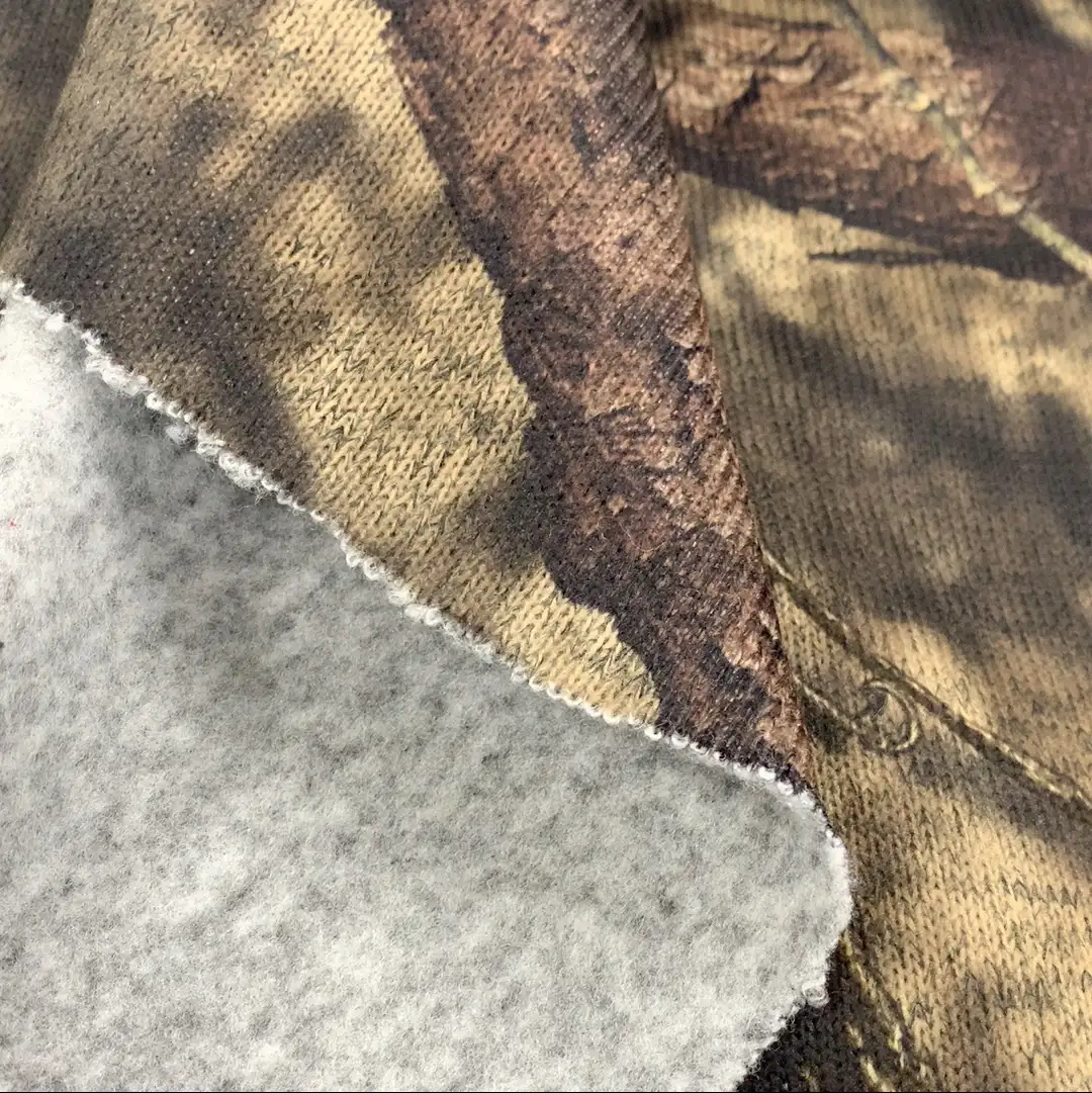 % 100% Polyester sıcak tutmak antistatik giysi avcılık elbise astarı açık kumaş baskı kamuflaj Napped katyon kumaş