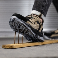 OEM/ODM Chaussures de sécurité de travail respirantes tissées volantes, mi-hautes, antidérapantes et souples