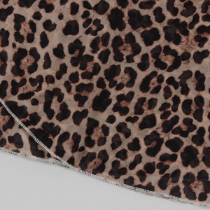 Nouvelle tenue sexy en maille à imprimé léopard à manches courtes et jupe peplum pour femmes, tendance - Product Image 6