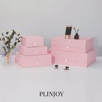 Boîte magnétique rigide pliable rose personnalisée avec languette à ruban pour l'emballage de parfums/vêtements/cadeaux/produits de beauté par Shenzhen HTD Packaging
