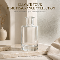 Flacon cylindrique élégant en verre transparent de 250 ml avec logo personnalisé et impression sérigraphique pour le stockage d'huiles essentielles et de parfums