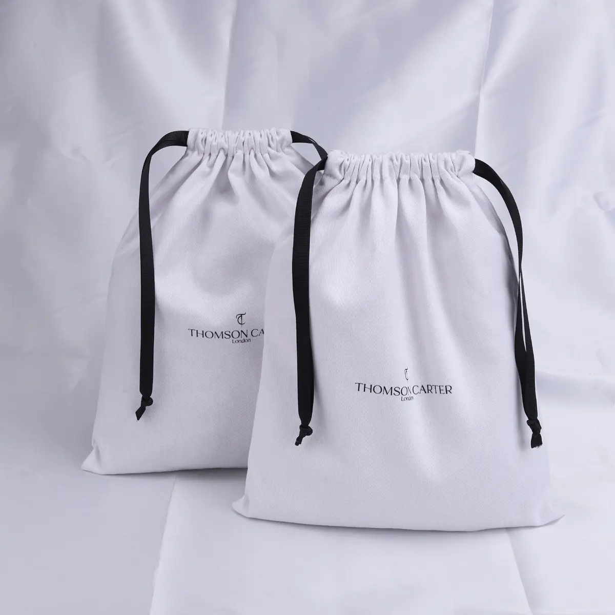 Özel Logo baskı pamuk dimi İpli ayakkabı hediye paketleme torbası beyaz pamuklu toz torbası alışveriş çantası