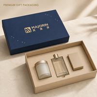 Boîte cadeau rigide en carton de luxe personnalisée avec couvercle et base, logo en relief doré et insert en papier pour emballage cosmétique