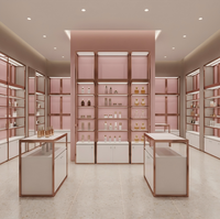 Étagères de présentation pour magasin de vêtements sur mesure, mobilier de présentation rose pour boutique de vêtements féminins, fabricant OEM