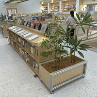 Ensemble de sièges modulaires en profilés d'aluminium pour bibliothèque, vitrine de livres avec roulettes et jardinière pour librairie