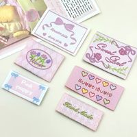 Étiquettes de vêtements en tissu polyester à motifs de dessins animés, patchs brodés colorés, lavables, imprimés en sérigraphie, en fil fin haute densité