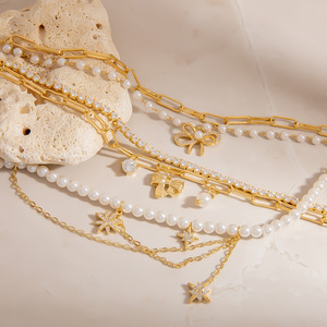 Collier de perles à double rangée, chaîne dorée, pendentif nœud et étoile en strass, bijoux pour femme à porter au quotidien - Product Image 1