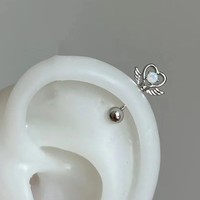 Simple niche personnalité mode géométrique goujon piercing bijoux en acier inoxydable dégoulinant d'huile papillon goujon oreille os