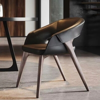Fauteuil de loisirs en cuir noir de style nordique simple, chaise de salle à manger de luxe avec structure en bois pour hôtel, villa, restaurant