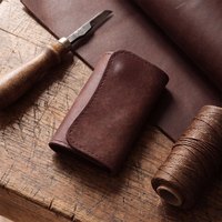 Pochette à clés en cuir véritable pour homme, fermeture à bouton, organisateur de clés multifonctionnel, style jeune, sac de rangement en cuir de vachette
