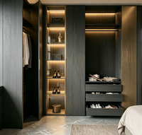 Dressing moderne gris foncé avec armoire intégrée, éclairage LED, coiffeuse et meuble de rangement sur mesure pour chambre à coucher