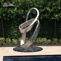 Sculpture abstraite TREVI en acier inoxydable poli miroir, populaire pour les villas modernes, vente en gros pour l'extérieur