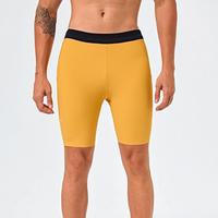 Short athlétique décontracté 2 en 1 et collants de compression pour hommes avec poches élastiques à la taille Séchage rapide et respirant