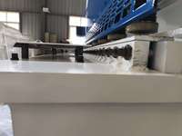 QC12Y8x4000mm |   Mesin Pemotong Plat Logam Panjang dengan Meja CNC Hidrolik dan Sistem Swing Beam