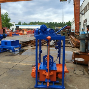 Machine manuelle à blocs de béton Shunya QM2-45 <span class=keywords><strong>pour</strong></span> la fabrication de briques <span class=keywords><strong>creuses</strong></span>, 220 V monophasé, 30 ans d'expérience - Product Image 1
