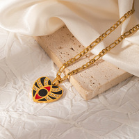 Collier en acier inoxydable plaqué or 18 carats avec pendentif cœur rouge émaillé motif battement de cœur et chaîne Figaro, bijoux pour femmes et couples