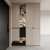 Meuble à chaussures haut de gamme sur mesure avec espace de rangement dédié pour bottes, idéal pour les entrées de villas de luxe, pour bottes longues et chaussures en cuir