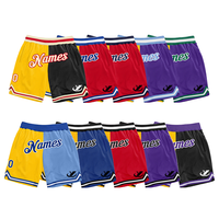 Shorts de basket-ball personnalisés professionnels en mesh respirant, coupe athlétique avec technologie de séchage rapide et couleurs d'équipe