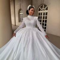 Gaun Pengantin Lengan Panjang Kerah Tinggi Berhias Manik-Manik Berkilau Model Ball Gown