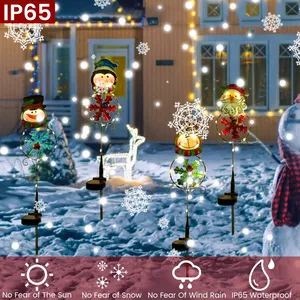 Outdoor LED Solar Powered Snowflake Xmas Pathway Lights Metal Garden palo pupazzo di neve babbo natale Lawn Yard Ornament