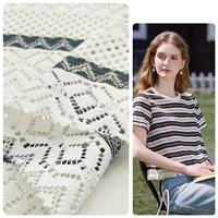 ANONO Nouveau Produit Surplus Lots Polyester Jacquard Tissu Tricoté pour Robe Tissus Textiles