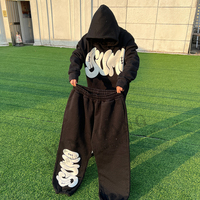 Survêtement noir personnalisé avec logo imprimé en relief et strass, comprenant un sweat à capuche et un pantalon de jogging, ensembles de survêtements à strass