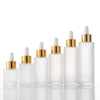 20ml 30ml 50ml 60ml 100ml Flacon compte-gouttes transparent d'essence de sérum pour les soins de la peau Flacon rond en verre transparent mat avec compte-gouttes blanc