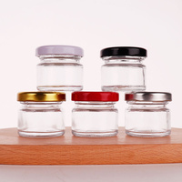 Bocal en verre rond vide avec couvercle métallique transparent pour le stockage du miel, de la confiture et des cornichons