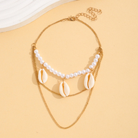Chaîne de bras à 3 couches avec coquillages cauris et perles, pendentif chaîne dorée, bijoux de plage superposés, cadeau unisexe, alliage tendance pour soirée