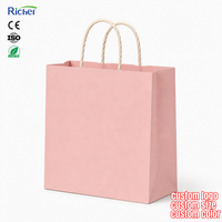 Sacs en papier kraft recyclé écologiques rose clair avec poignées en papier pour boutiques, commerces de détail, magasins de cadeaux, impression de logo personnalisée, promotion